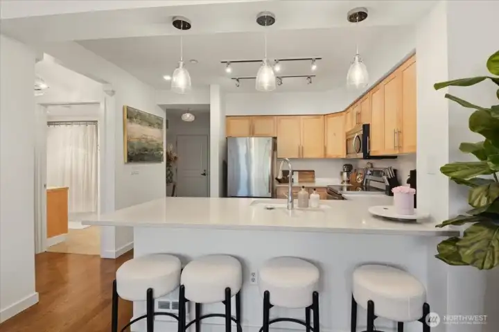 The kitchen's casual dining, looking toward the entrance and foyer.