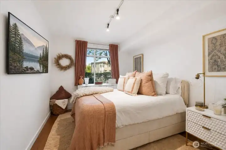 Bedroom features a large, walk-in closet with California Closet system.