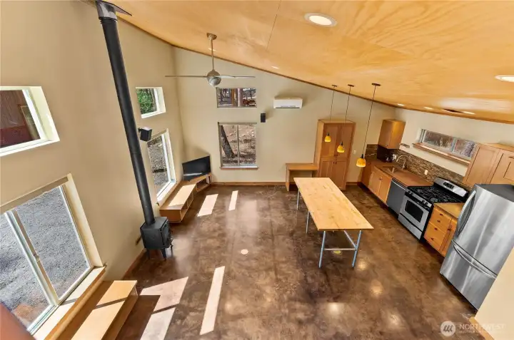 View of main living space & kitchen from loft