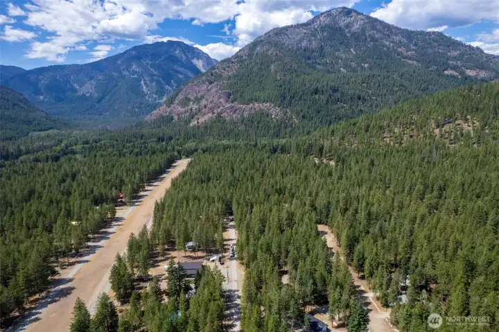 Overhead view of Lost River Runway, property on far right, lower corner of photo. See grey roofs in the trees on the right hand, lower left of photo.