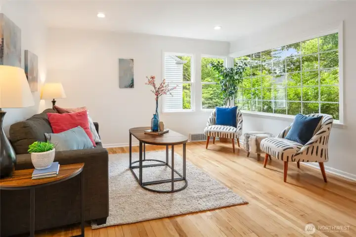 Corner windows fill this inviting living room with year-round light and garden views.