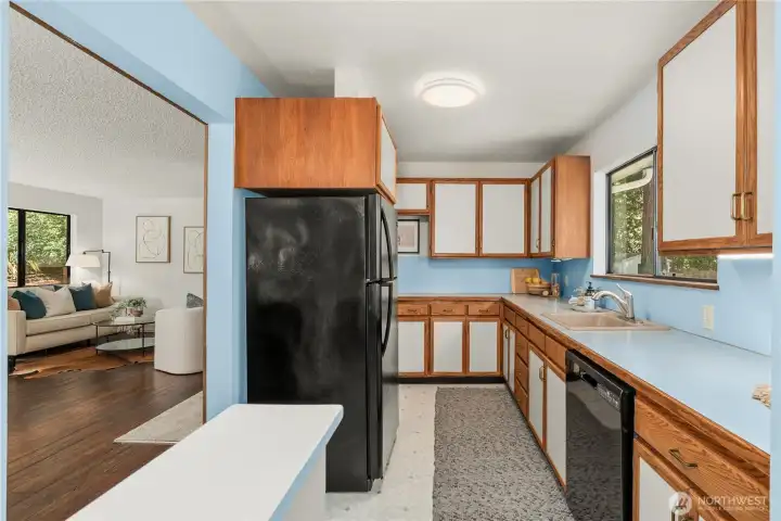 Seamless flow from the kitchen to the dining/living areas and backyard