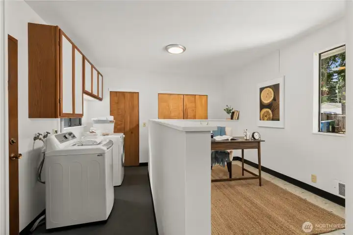 Versatile space with endless possibilities: laundry, home office, or craft room