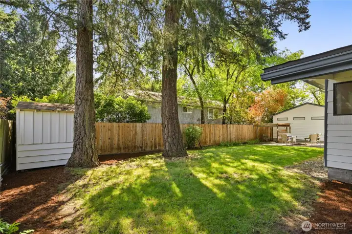 Convenient additional storage shed located in the backyard