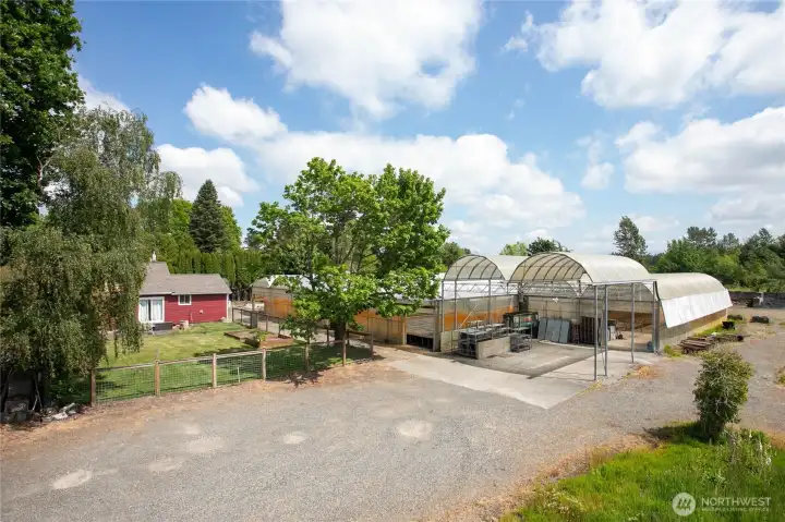 3, 3,000 square foot gutter connected greenhouses