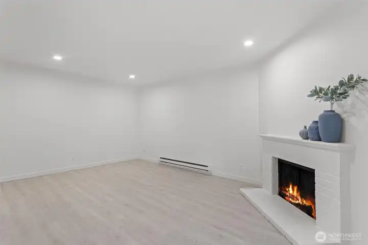 A functional living room filled with abundant natural light and a peaceful atmosphere.
