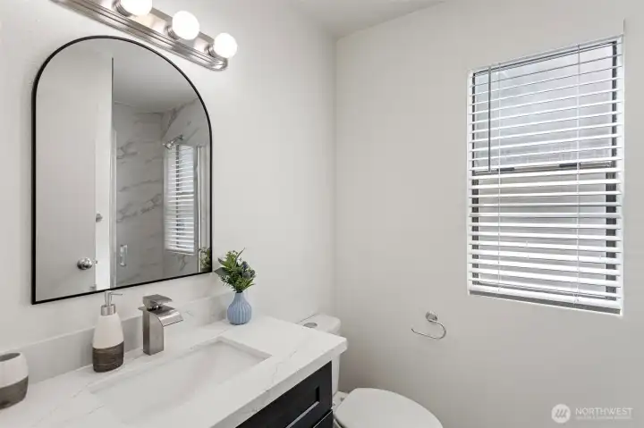 Primary bedroom with ensuite bathroom.