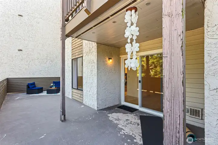 The expansive deck creates a true indoor-outdoor living experience, with a partially covered area providing extra comfort. It’s the perfect space to relax, gather with friends, exercise, or simply enjoy the natural surroundings and the sounds of birds.