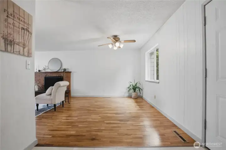 Great Room with refinished original hardwood floors...