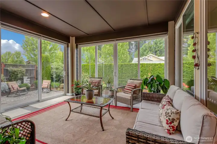 Check out the VIEW!! Come on in, relax and enjoy your private backyard, watch the hummingbirds, listen to the calming sounds of your private waterfall, and smell the roses and flowers as the aromatic cross-breezes waft across your enclosed (yet open) space.