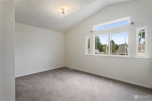 Bedroom 1 w/ vaulted ceiling