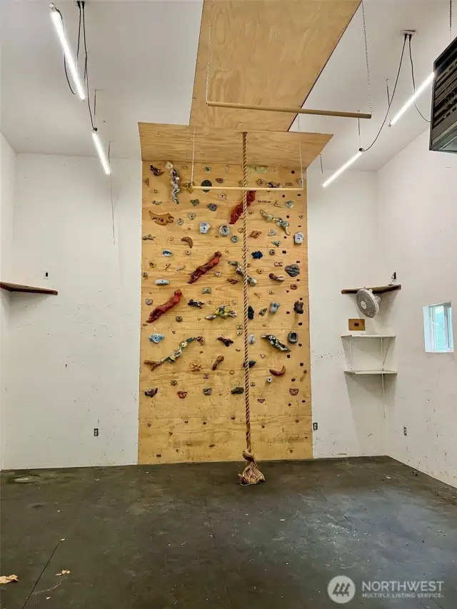 One of the garages has a custom climbing wall, this is such a cool and unique feature! Fun for kids of all ages!