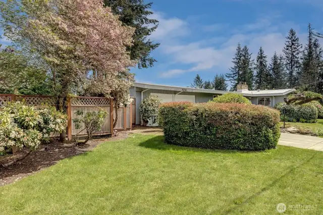 This expansive 9,800 SF lot features a spacious, fenced yard on the north side—ideal for gardens, play areas, or outdoor entertaining