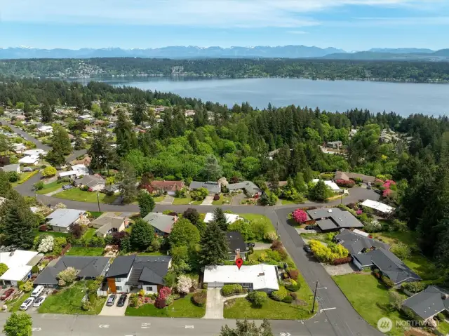 Generous 9,800 SF corner lot in this coveted neighborhood, with sweeping views to the South and Southeast