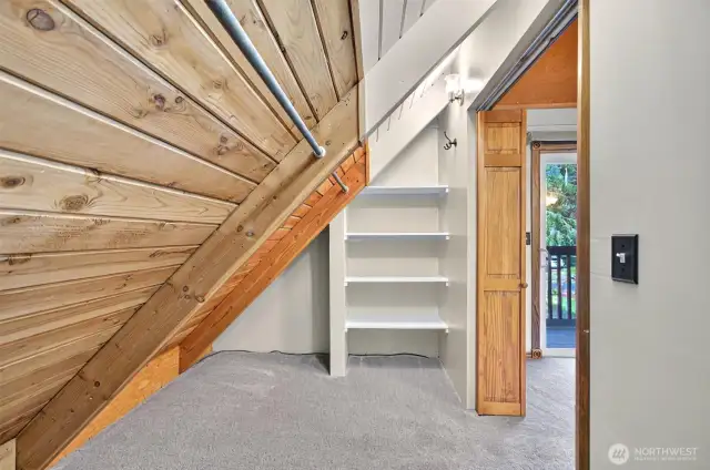 Large walk in closet for the primary with walkout balcony in the right corner.