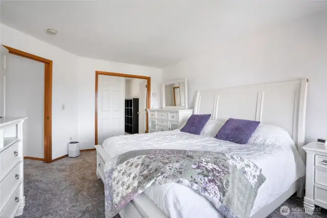 Primary bedroom (bonus room through the doors