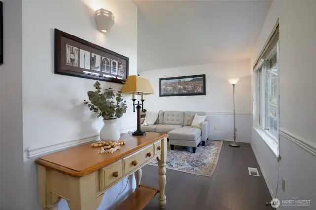 At the entry looking toward the living room, bamboo flooring