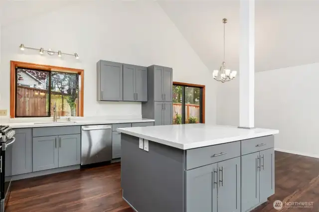 Newly updated kitchen with quartz counters & all new appliances.