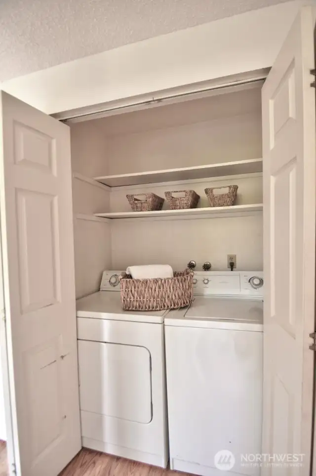 Convenient placement of washer/dryer central in each unit.
