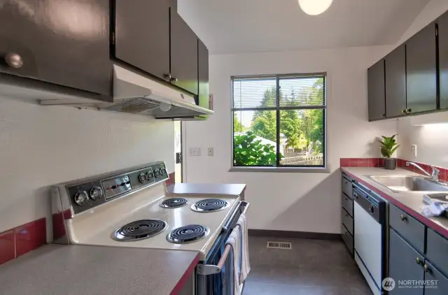 In 1843 Yew, a similarly efficient kitchen with natural light and a view to the yard.