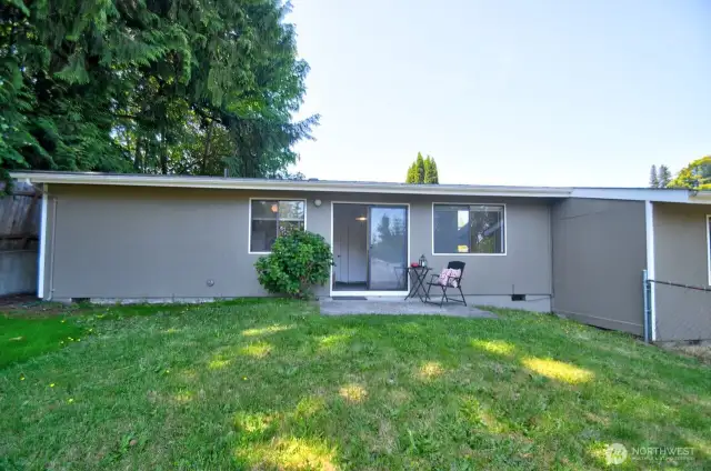 Exteriors recently repainted! The units were built offset from one another, creating more privacy indoors and out.