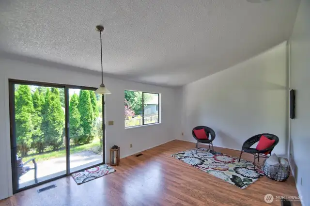 Inside, each unit features tall ceilings and light & bright outlooks to the backyard greenery.