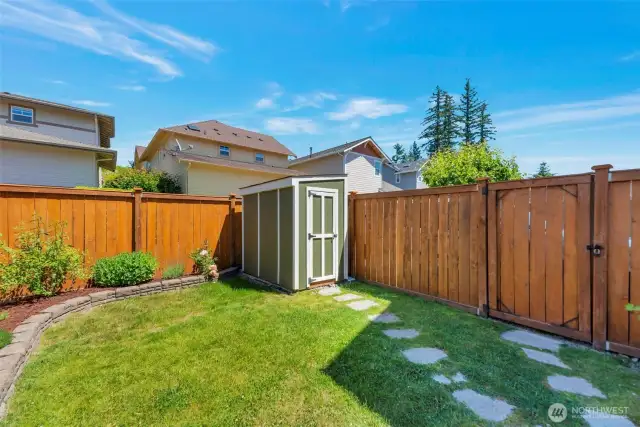 Private backyard with storage shed