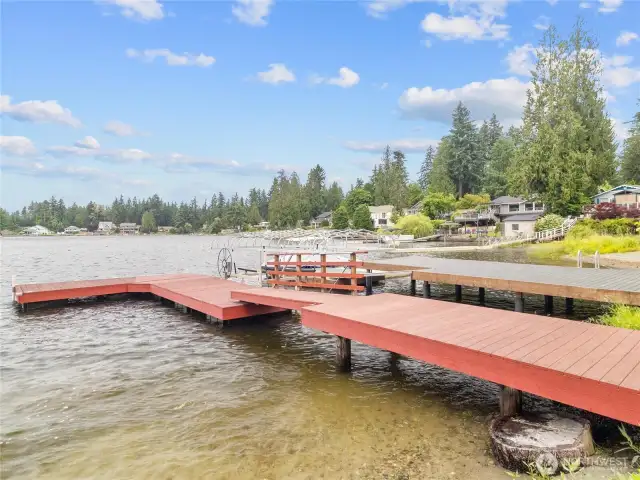 50 foot long dock with boat lift and cover.