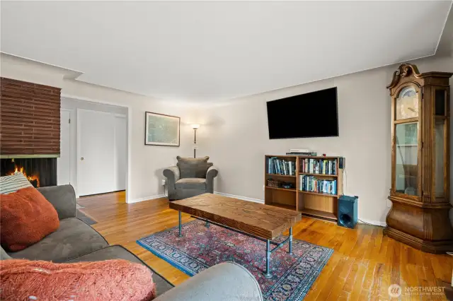 Living room with wood burning fire place