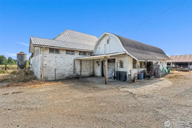 Milking parlor and office next to 1903 barn.