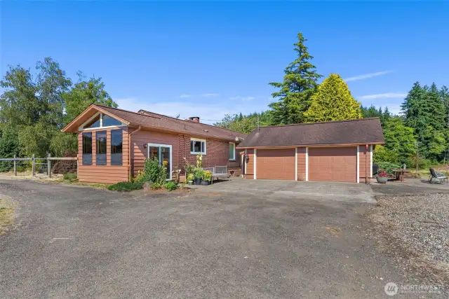 Main home with detached 2 car garage.