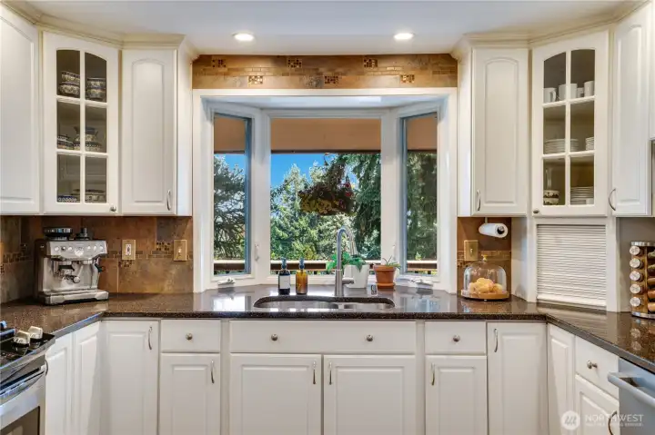 Tuck bread, honey, butter, and tea into the little cubby on the right and grow herbs in the light of the bay window.