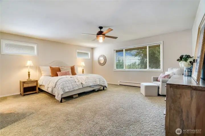 Continue beyond the living room to the main floor's primary suite complete with a walk-in closet and a private, 3/4 bath.