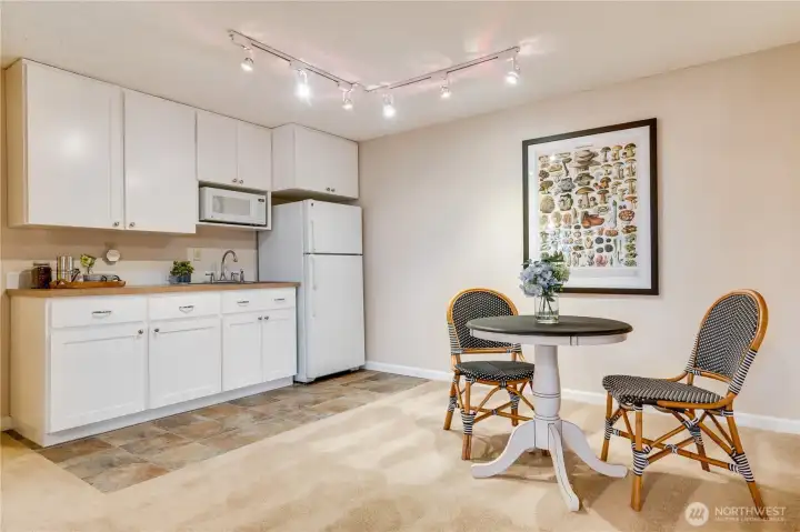 The kitchenette enhances the convenience and versatility of the daylight basement. Fix a quick snack, make coffee, host parties, or consider the multi-generational living potential.