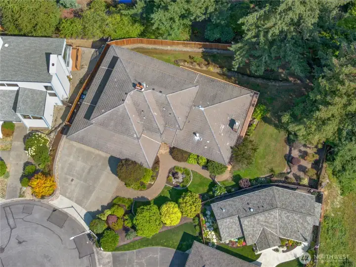 This 5,368 sq ft home (plus the 1,000 sq ft garage) is set on a 16,375 sq ft lot with mature landscaping, a fenced yard, and a fountain to welcome visitors in the front garden.