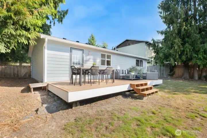 Step outside to a huge Trex-style deck