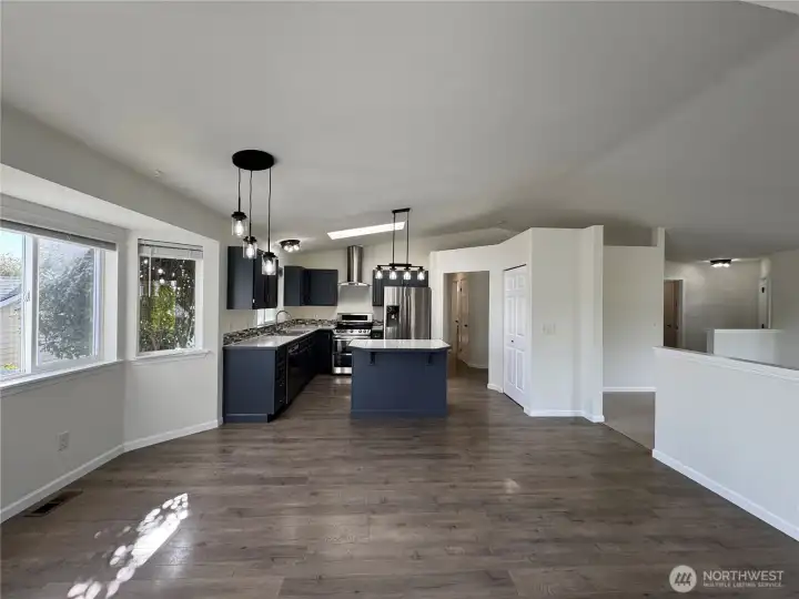 Kitchen opens to dining space.