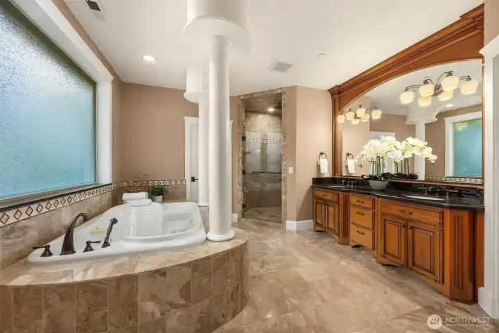 Heated marble floors, large jetted soaking tub, dual vanity, private water closet, large walk in shower