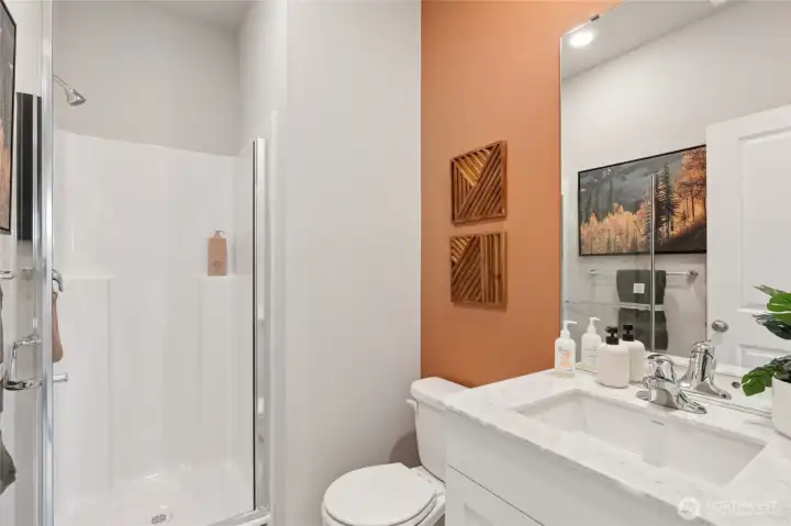 Main floor 3/4 bath perfect for guests. Actual home is under construction and finishes, materials, and colors will vary. See site agent for details.