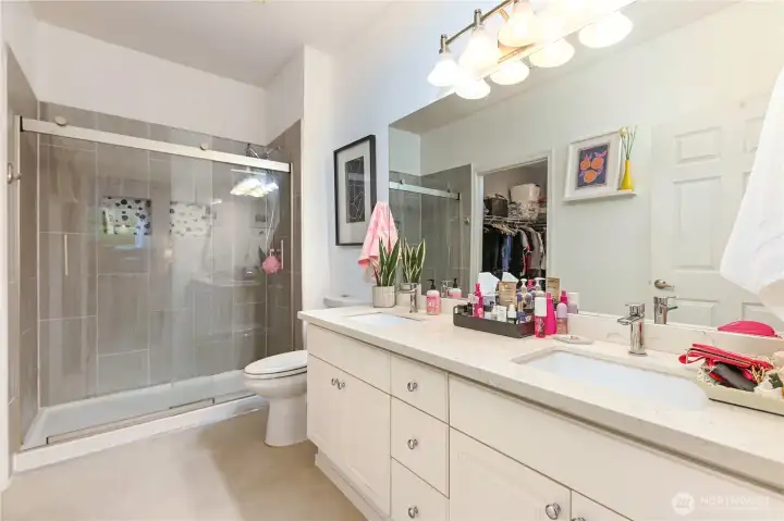 Primary bath with walk-in shower.