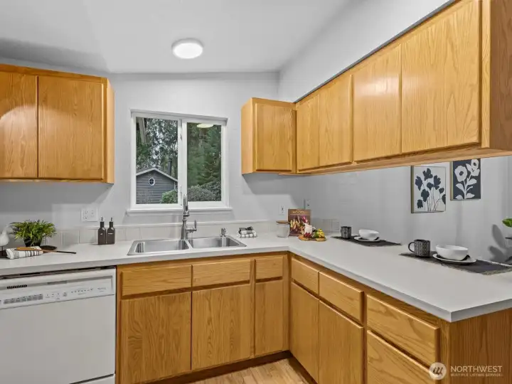 Immediately to the left is the spacious kitchen.