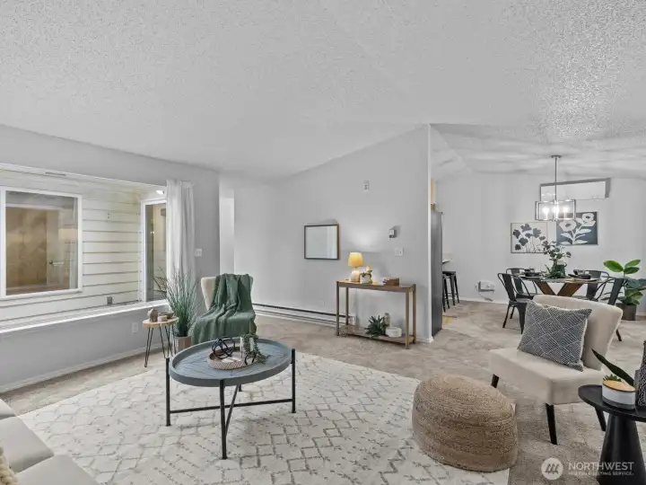 The vaulted ceiling really accentuates the space. Fresh paint and new carpet are a nice touch.