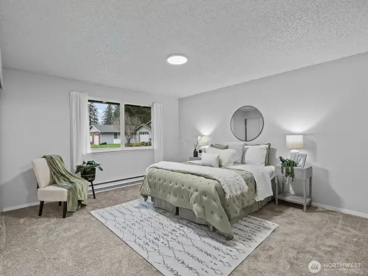 The primary bedroom is all the way at the end of the hallway for maximum privacy.