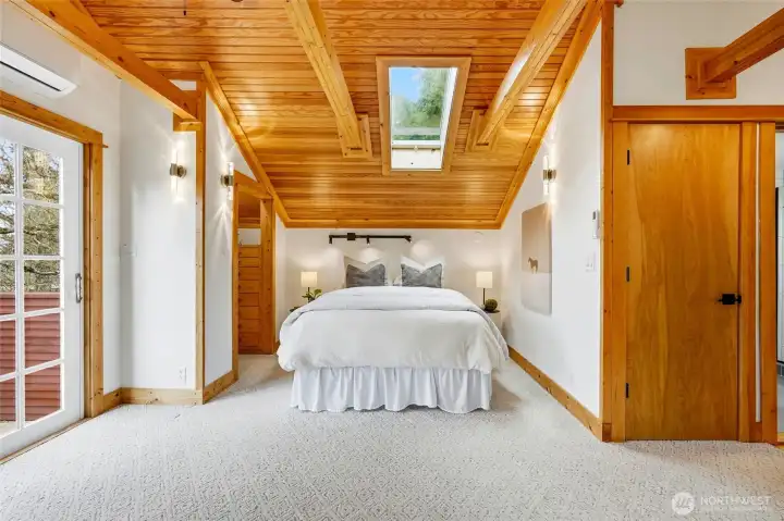 Primary suite. Washer and dryer to the right