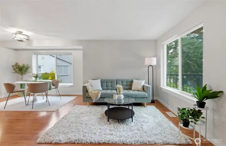 Bright living room with large windows and abundant natural light