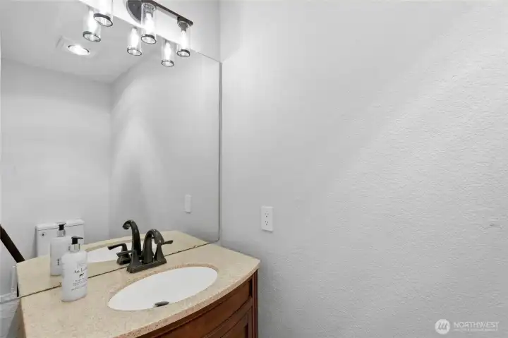 Convenient main floor powder room with updated finishes