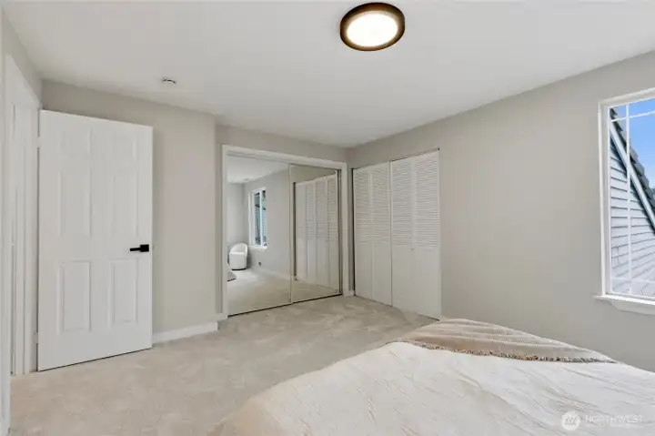Spacious bedroom with generous closet and storage space