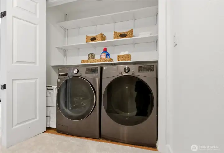 In-unit laundry area with washer and dryer