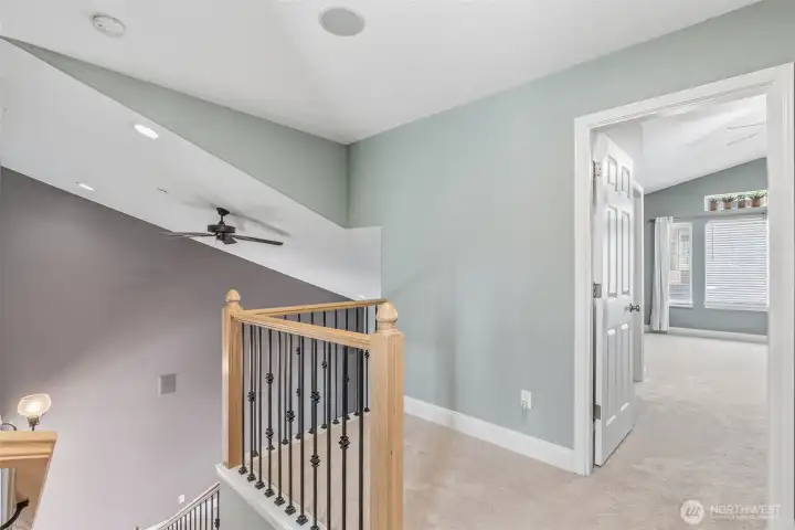 Upper landing with primary bedroom thru doorway