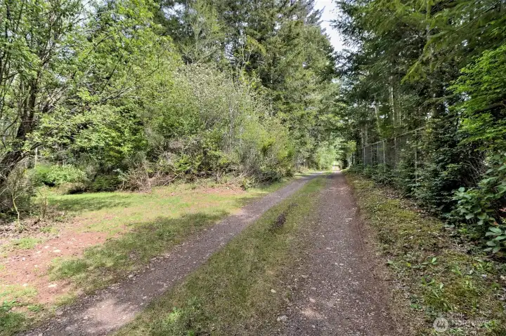 As you meander down this lovey driveway, all your cares will melt away...